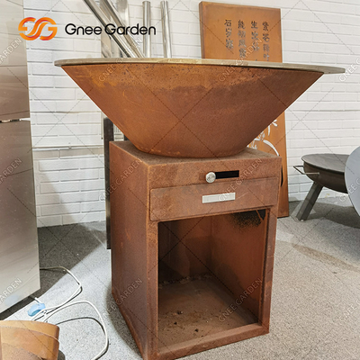 کباب پز زغالی باربیکیو رنگی زنگ زده در فضای باز با بشقاب پخت 100 سانتی متری گرد